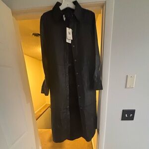 Brand New Ted Baker Black Leather Dress
Size 1
Can be worn as a Dress or coat.